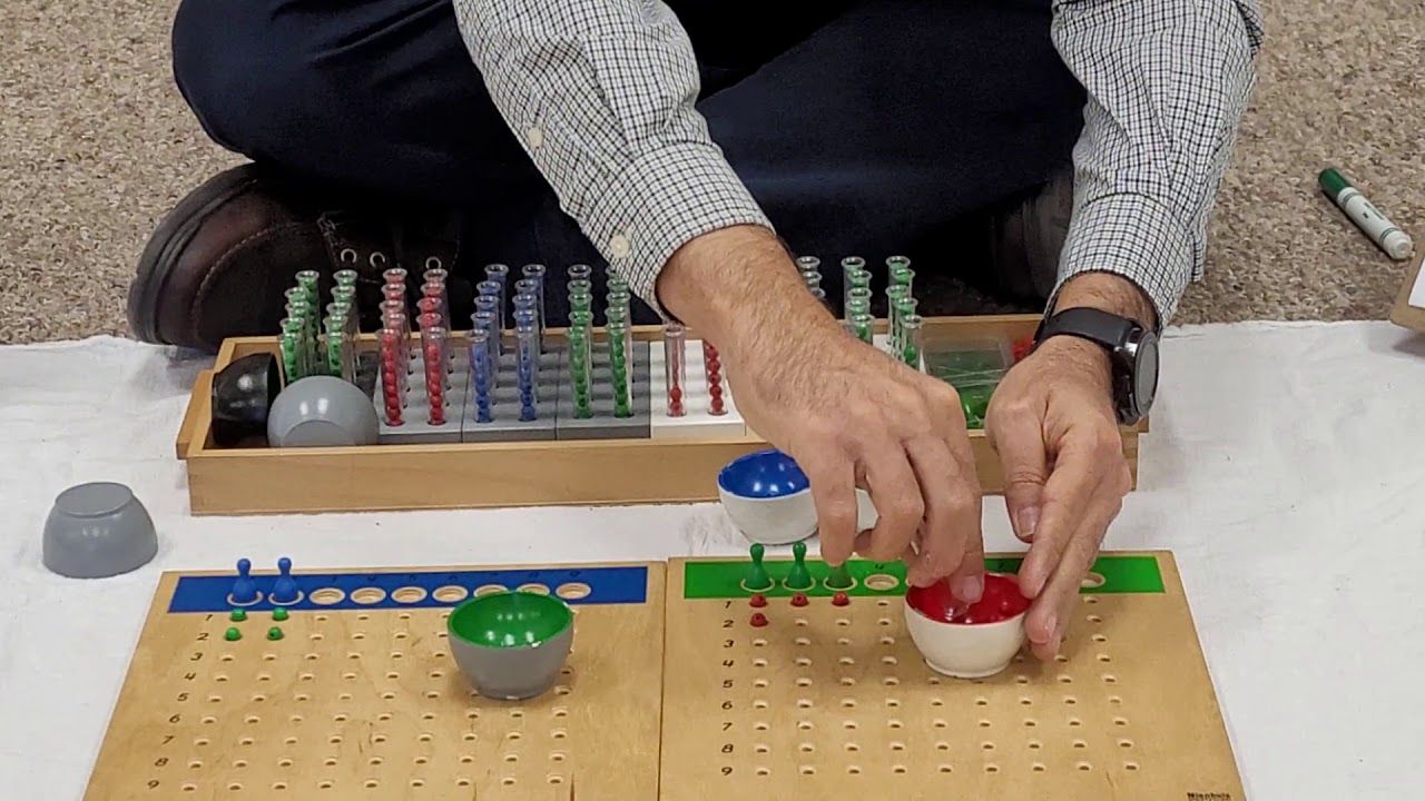 Double-digit division using Racks and Tubes (Test Tubes)