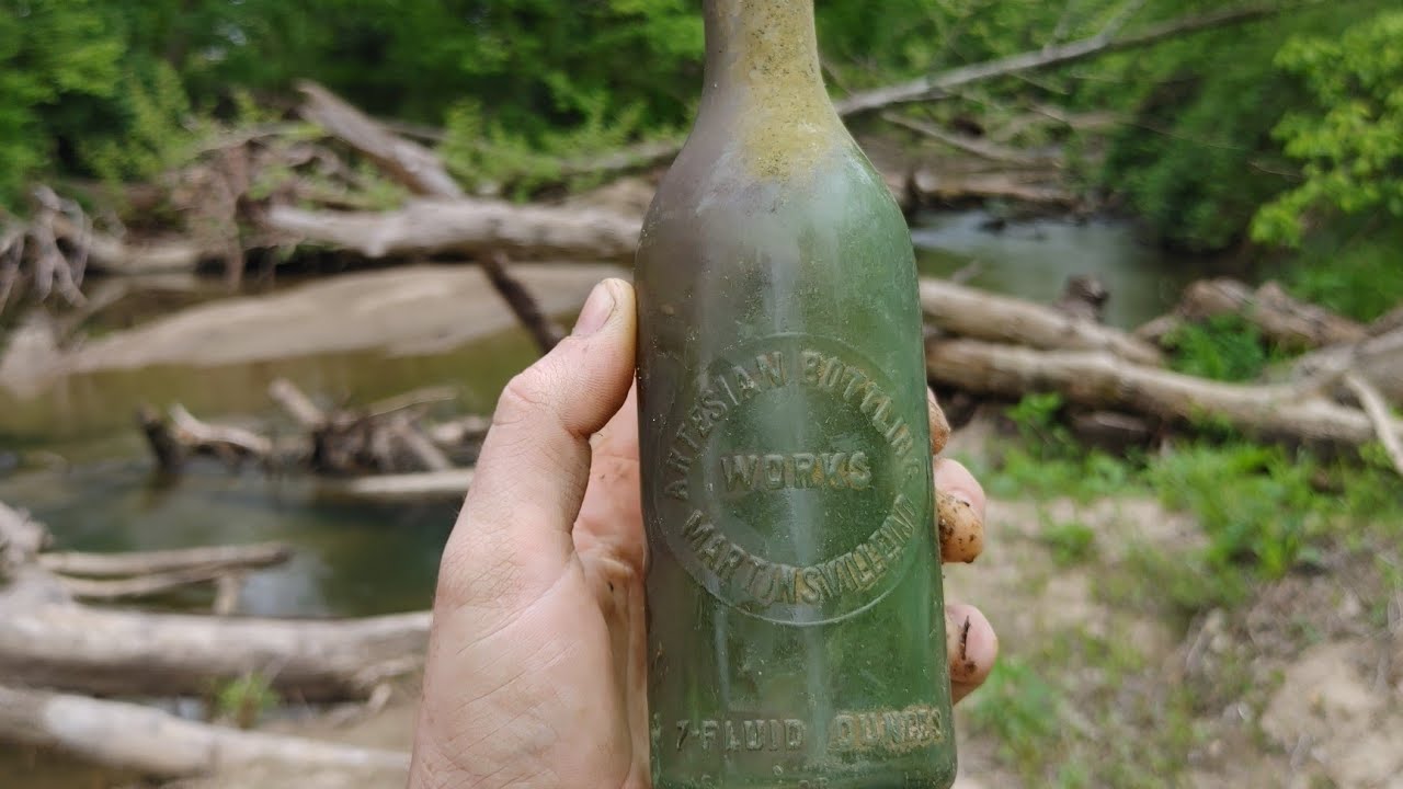 Creek walking for good antique bottles!!