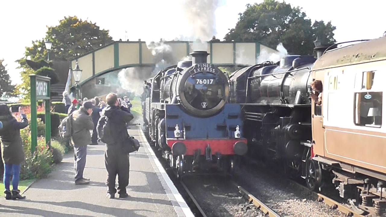76017 and 92212 on The 'Pines Express' through Ropley at the watercress line autumn steam gala 2016