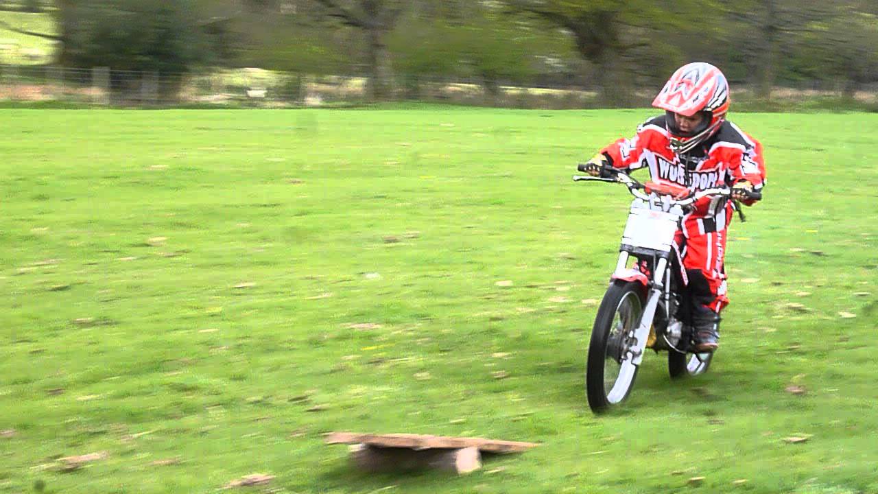 Mini trial Beta 50 with 5 year old Oz riding and jumping