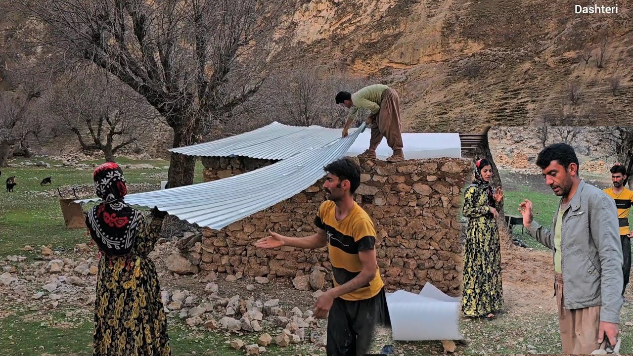 Leila and Shahin are happily installing the roof plate of the mountain hut.