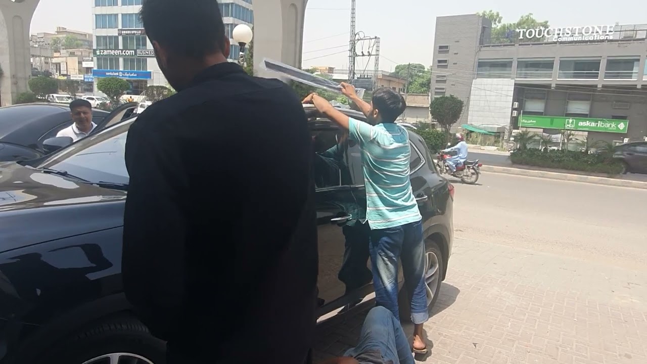 Applying of sun visor Air press tdx for MG Hs @ SEHGAL motors Rwp.