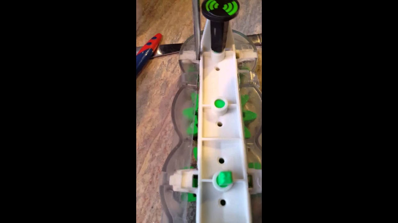 Cleaning the brushes on a Hoover Steam Vac