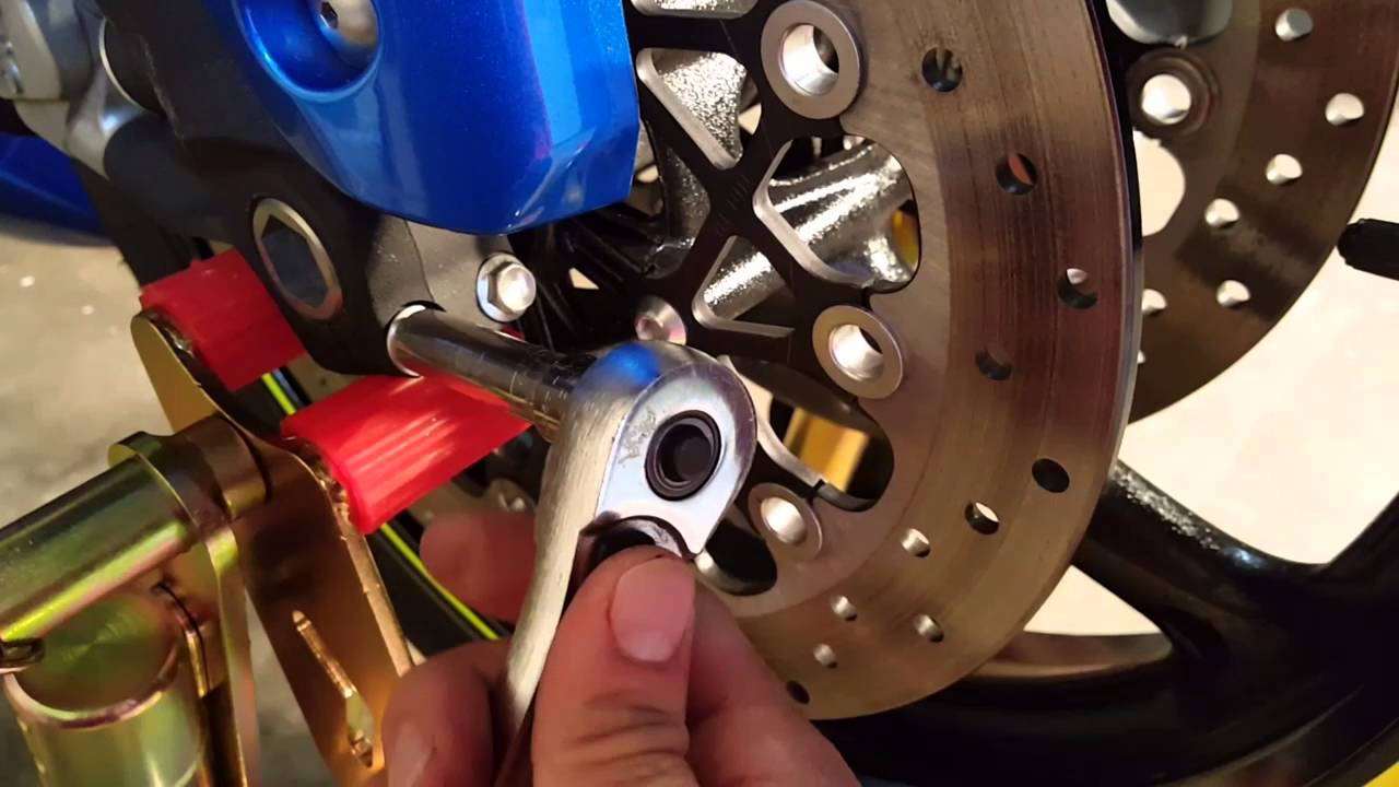How to remove front wheel from a motorcycle 2015 suzuki gsxr 750 part 1