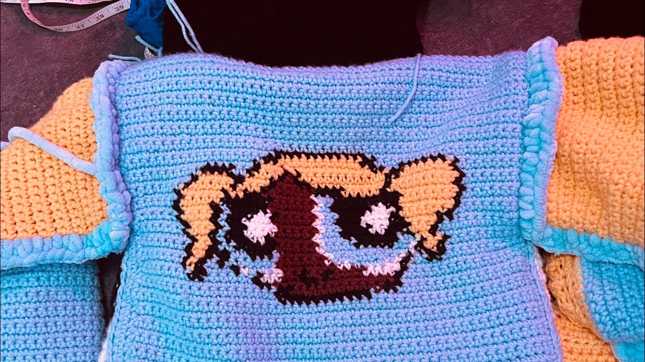 Crochet Reversible Bomber Sewing everything together