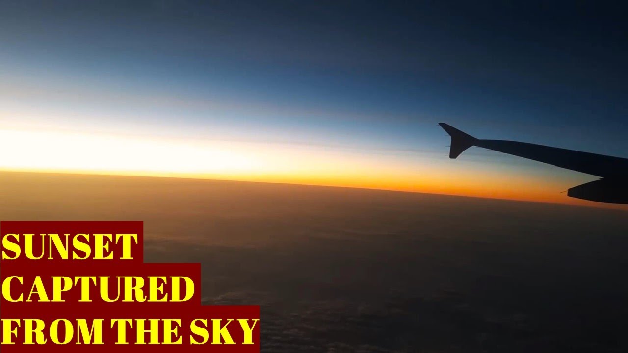 Beautiful view of sunset during flight from Goa to Lucknow. Aerial view of sunset and clouds.