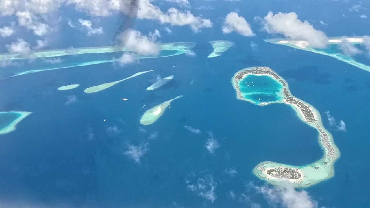 Maldives Seaplane Transfer: Manta Air Flight to Kandima Resort 🛩️🌊 | Stunning Aerial Views!