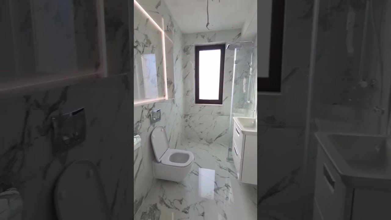 Va aratam o baie de 4 mp, gresie si fainta cu placi mari si lucioase, ce parere aveti?