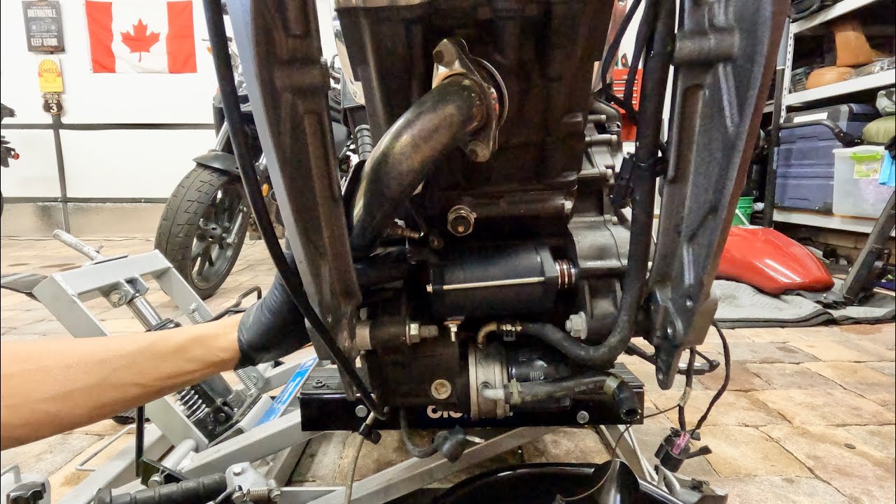 How to replace a STARTER and coolant on an Indian Scout motorcycle