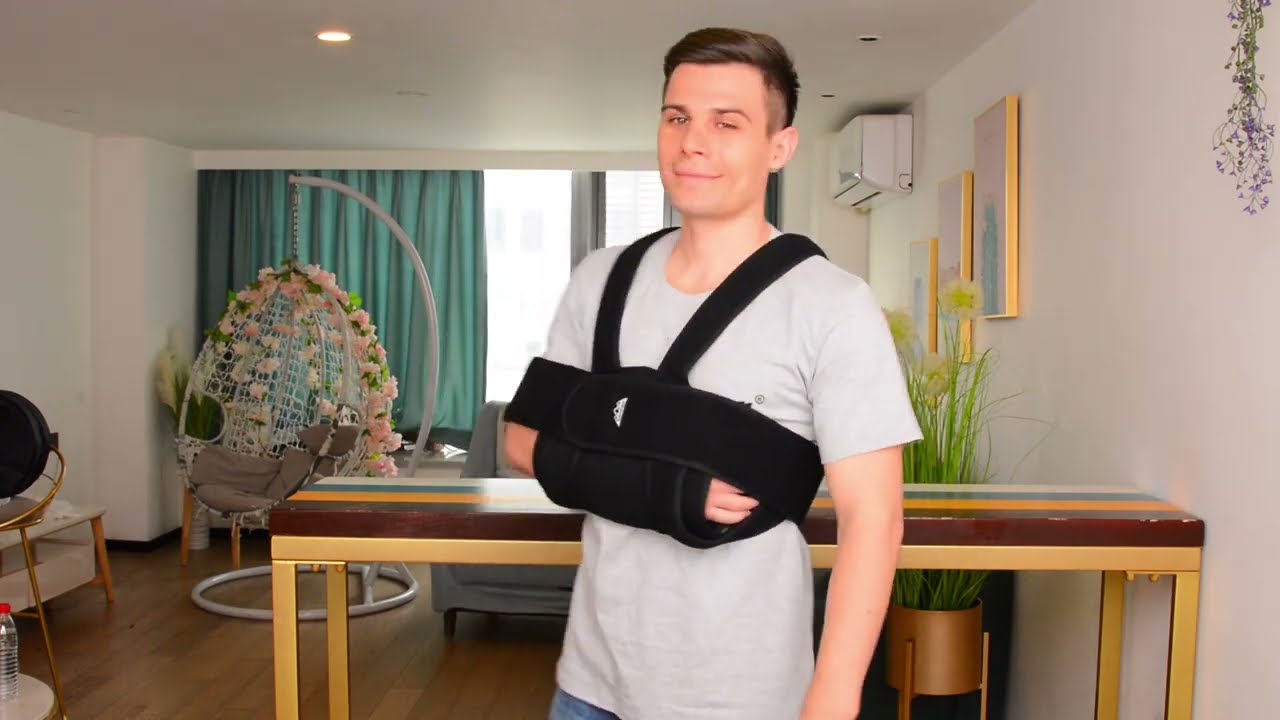 How to wear SupreGear Arm Sling Shoulder Immobilizer Support Brace (B083Z5DXNY)
