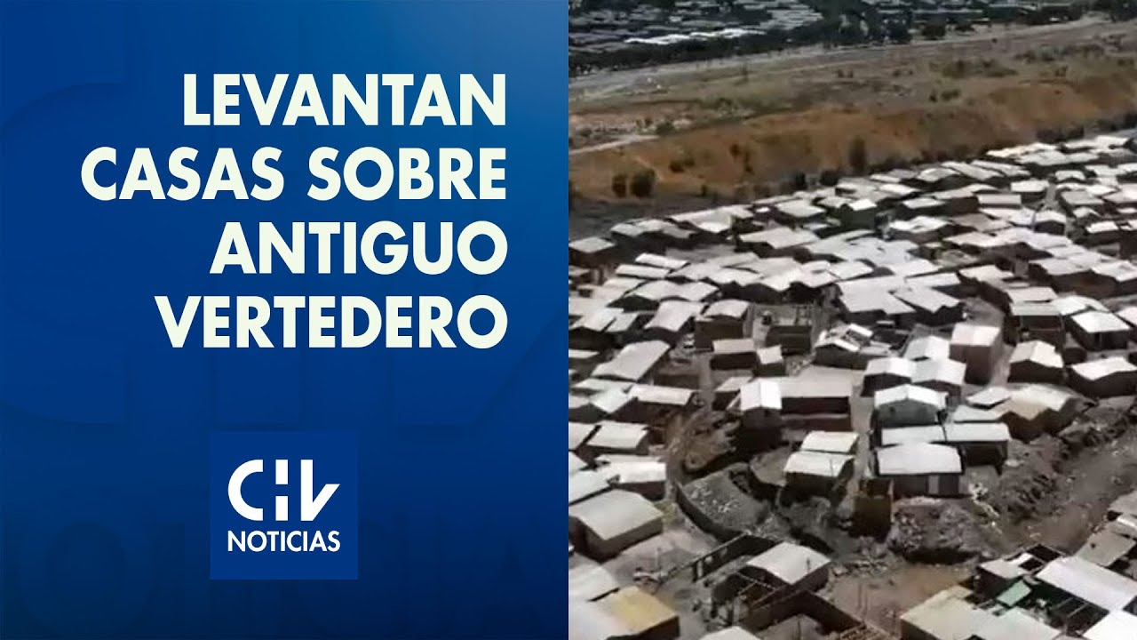 Miles de familias haitianas levantan sus casas en una toma ilegal sobre un antiguo vertedero