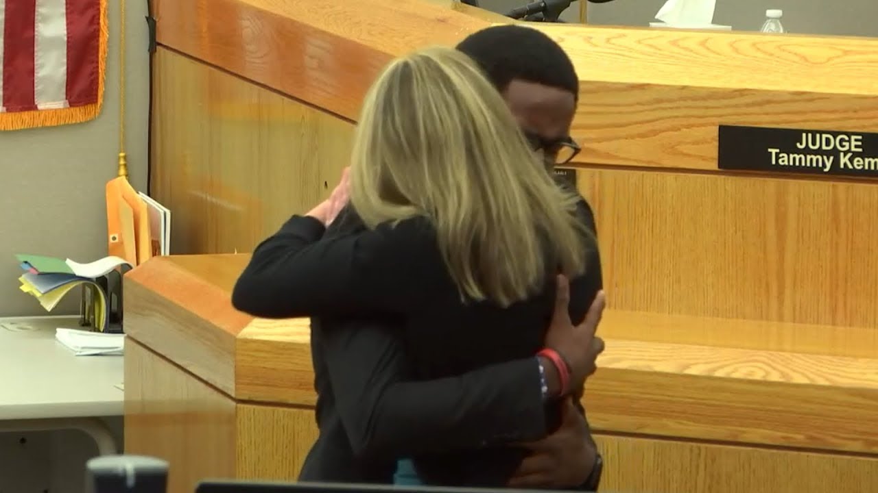 Botham Jean's brother gives ex-cop Amber Guyger a hug
