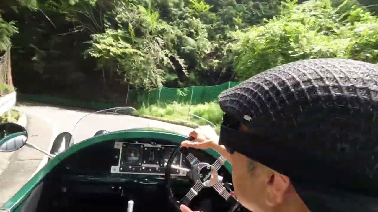 Watch out for falling rocks! Morgan 3 wheeler hill climb.