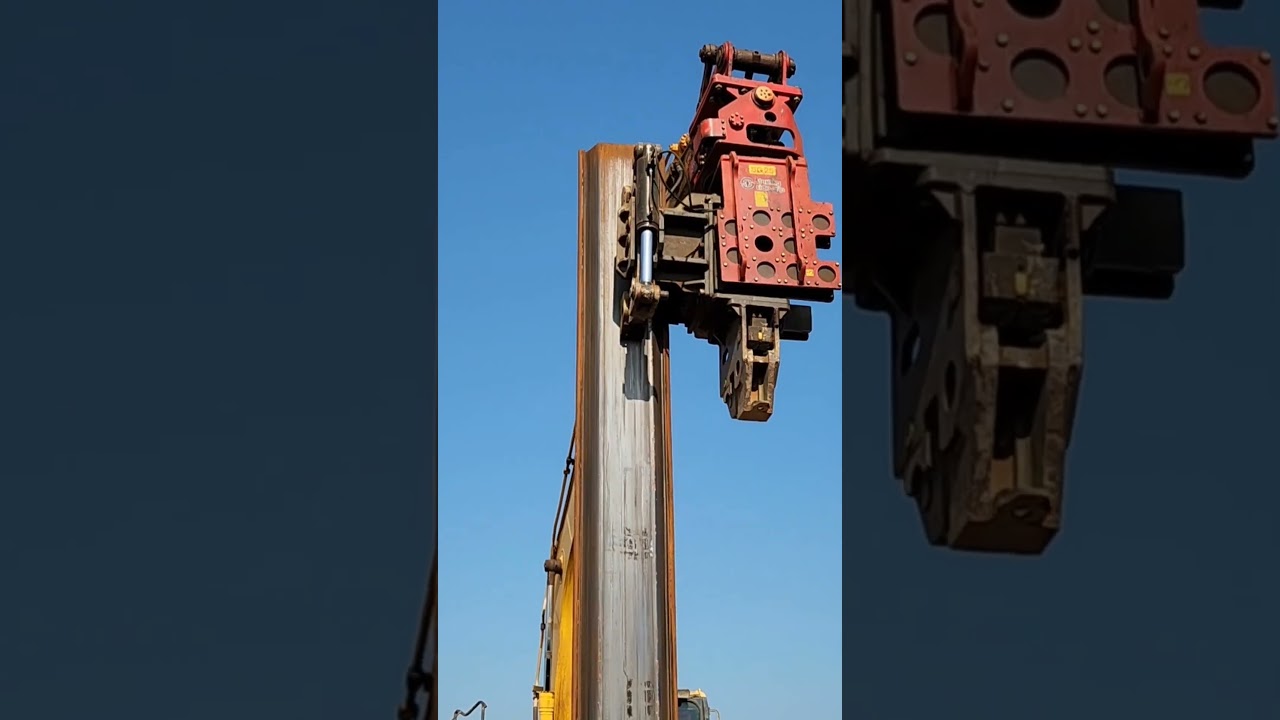 Sterling side-grip pile drivers pick up sheet piles from a stack on the ground #sterlingtechnology