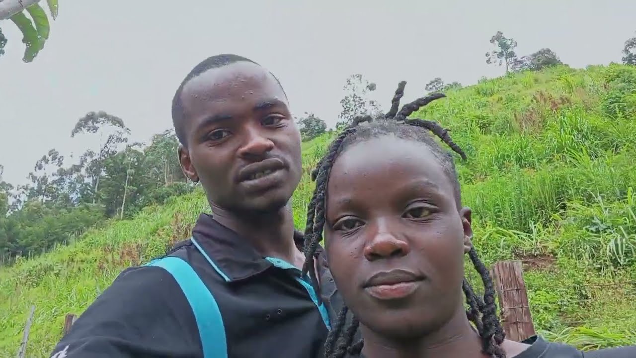 Watering Kai apple fence with Vennah