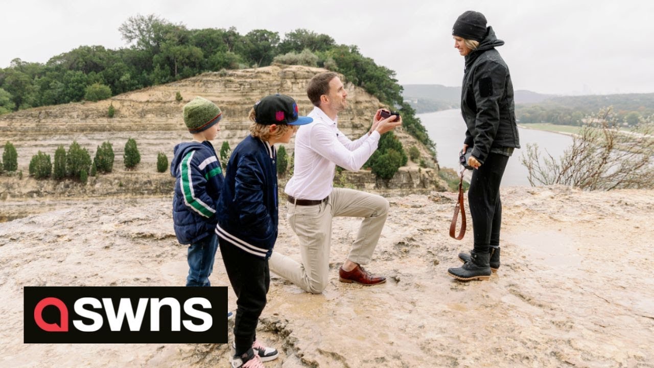 Heartwarming moment man shocks girlfriend with surprise proposal in front of her family | SWNS