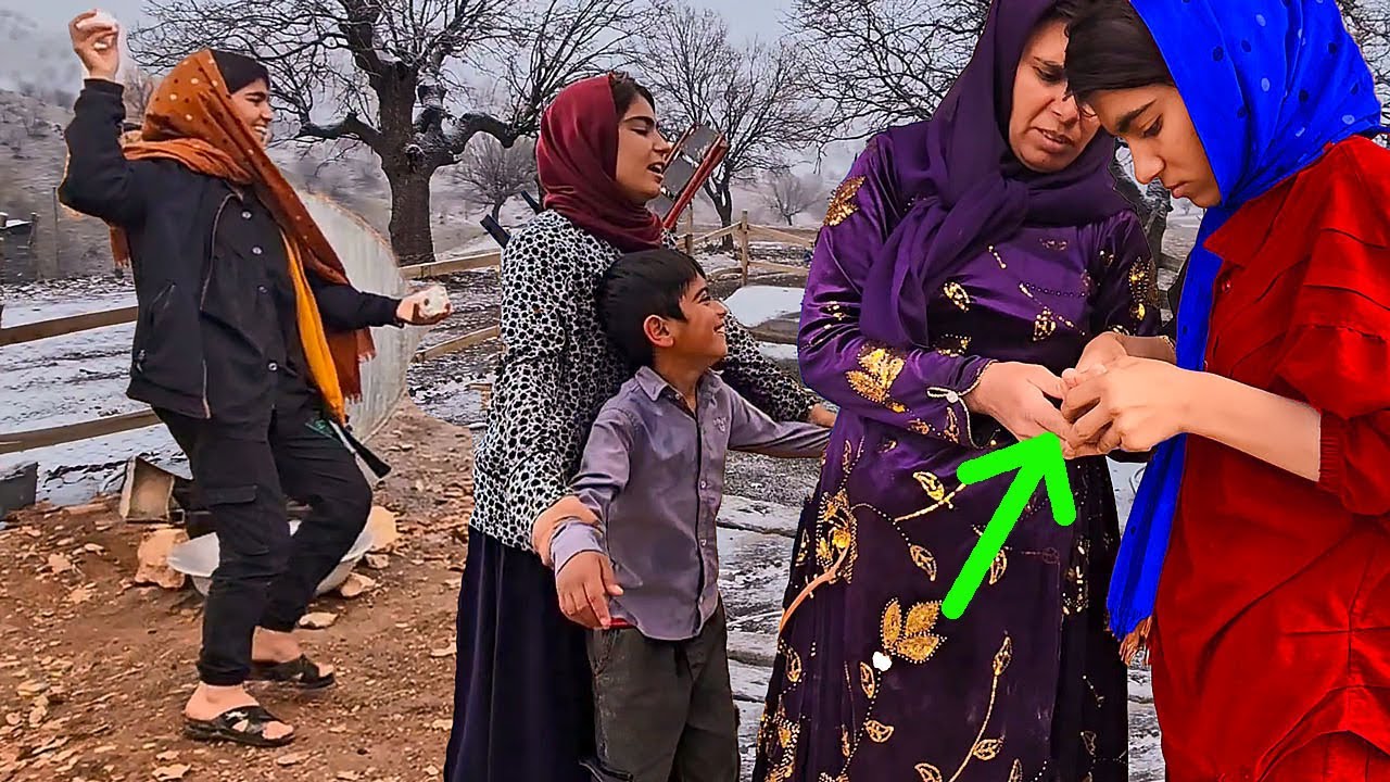 Fariba's hand injury after playing in the snow on the farm
