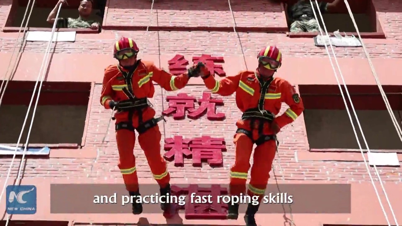 Chinese firemen demonstrate rescue stunts