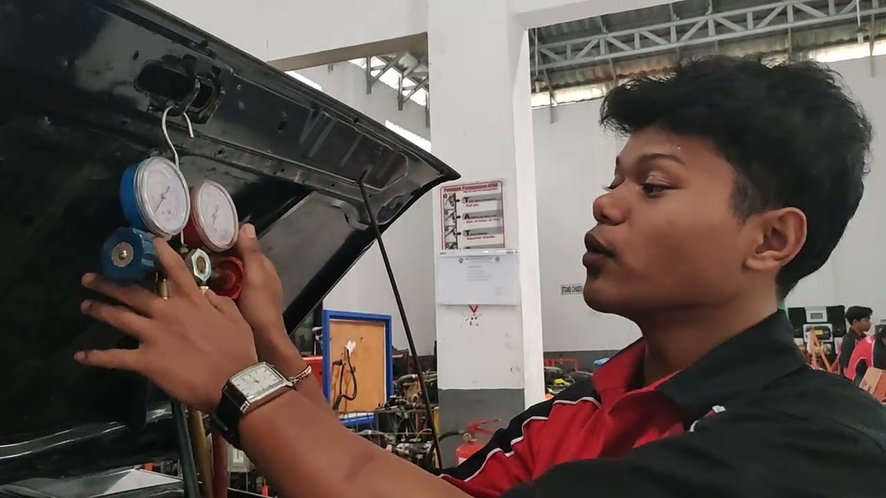 pengosongan freon dan pengisian freon 