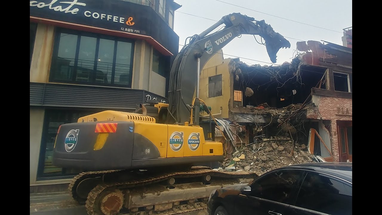철거 시내복판 밀집상가 비탈산업 중기