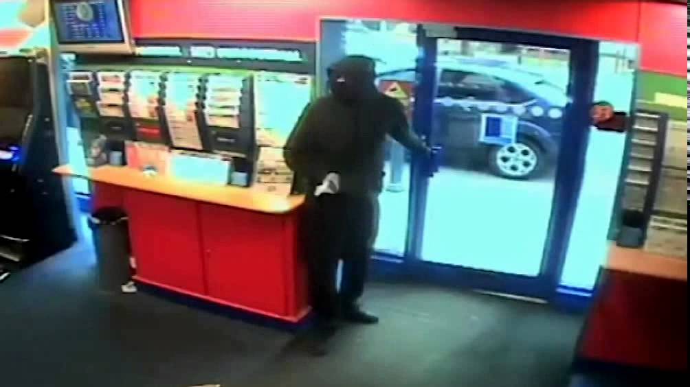 Robbery at Coral Bookmakers - Moston Lane - 13 June 2014