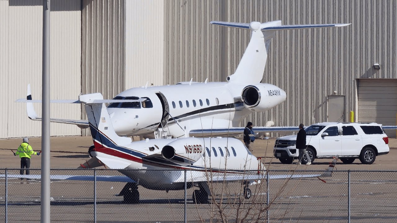 Legacy 500 Arrives at Lunken With a Passenger and Body Guard  -  DO YOU RECOGNIZE THE PASSENGER?