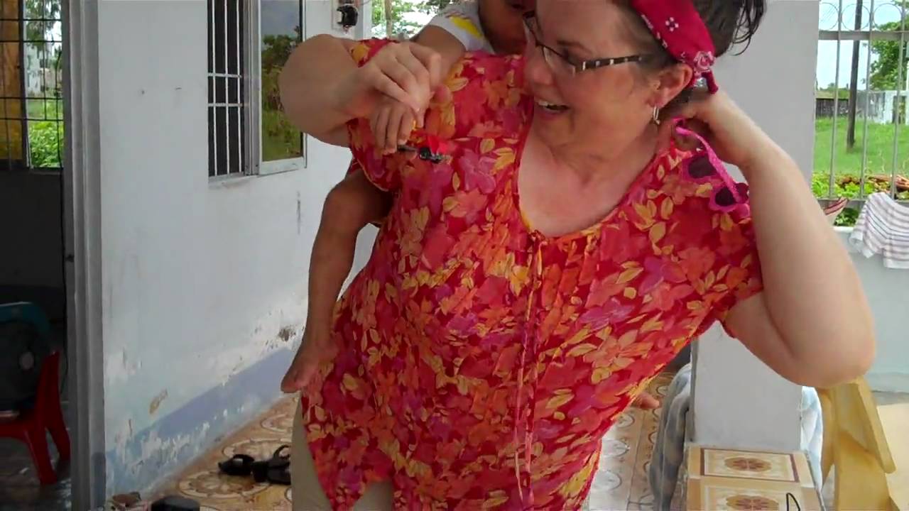 Claire, Jada, and Thomas get piggy back rides.MP4