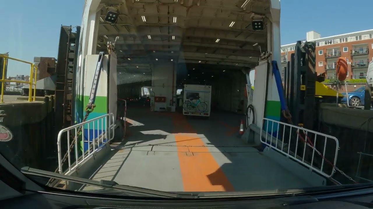 GX010746   DRIVING ONTO WIGHTLINK FERRY AT PORTSMOUTH 2023