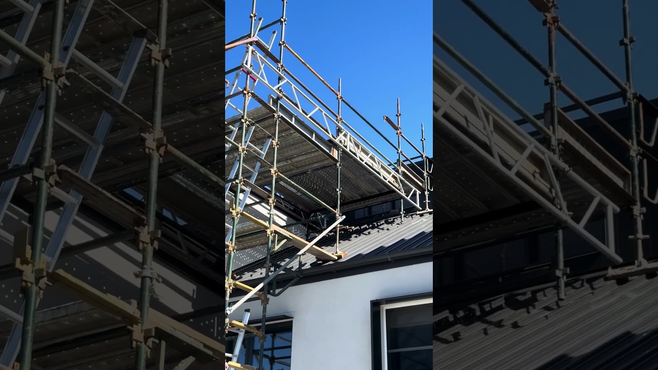 Scaffold Built On Angled Roof (video taken before splices were put in)