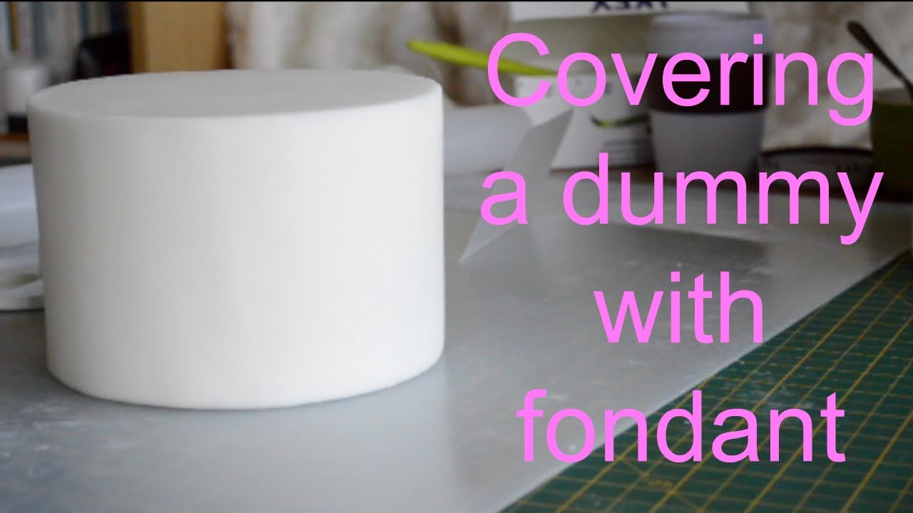 covering a cake dummy in fondant
