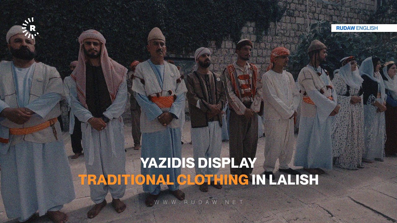 Yazidis display traditional clothing in Lalish