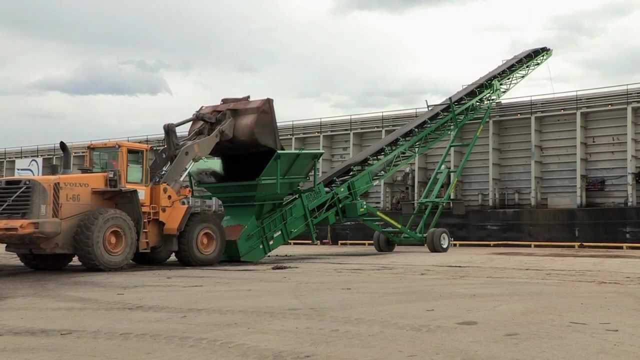 McKeil Marine Loading Millscale on barge Alouette Spirit