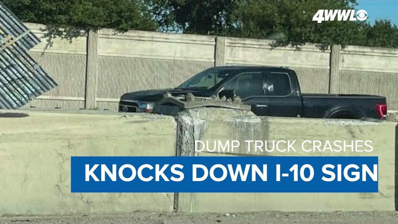 Dump truck driver loses control, brings down I-10 sign; 2 sent to hospital