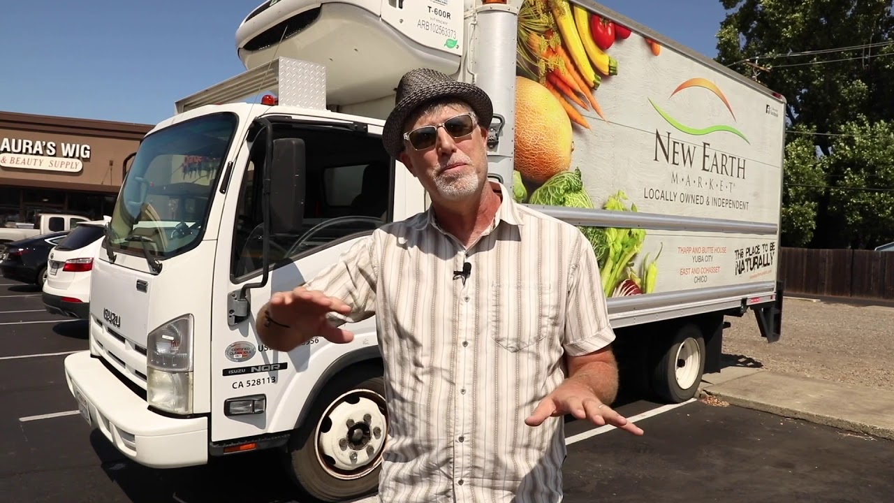 Grocery store owner discusses the benefits of their Isuzu refrigerated truck