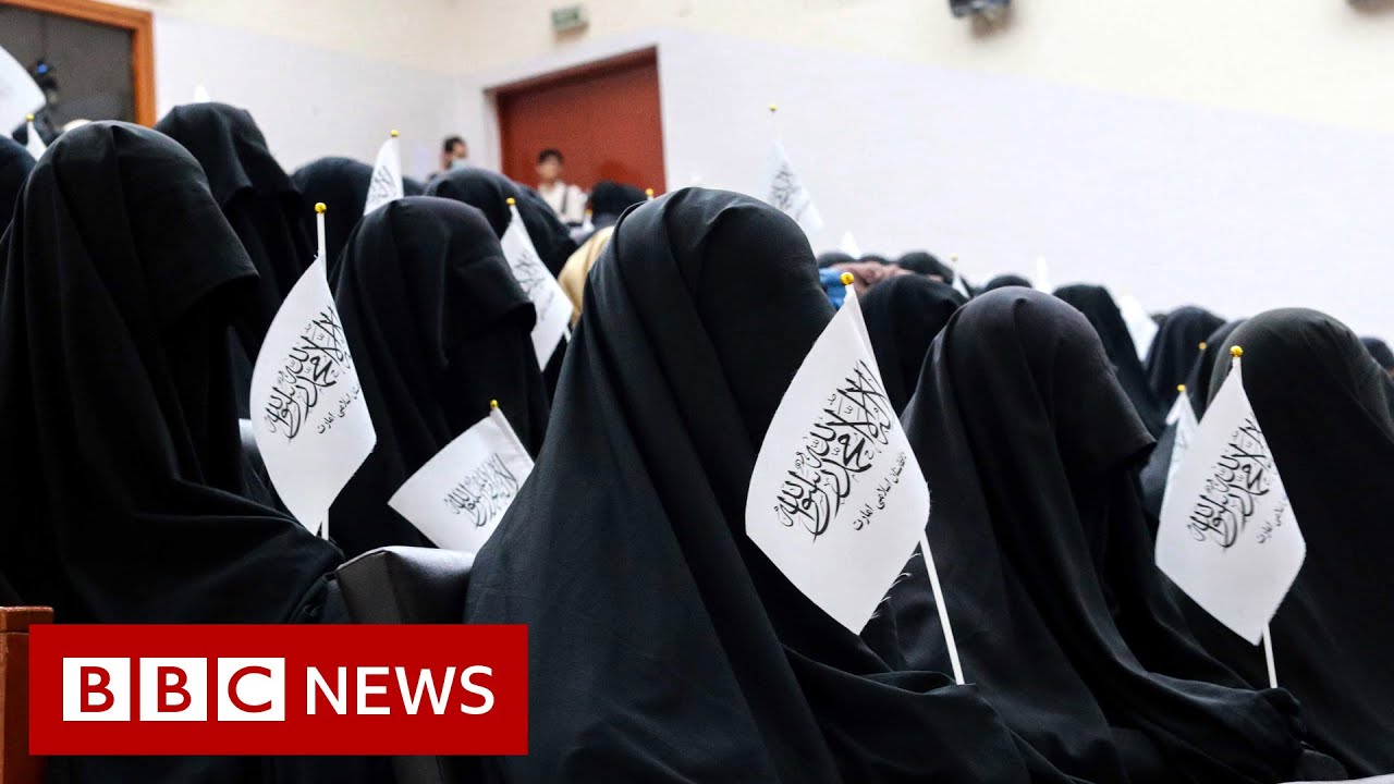 Afghan women protest Taliban dress code - BBC News