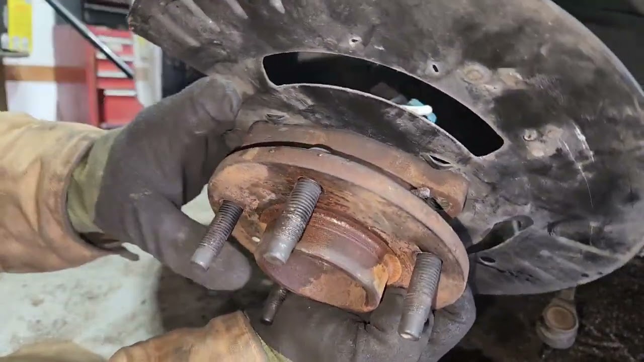 2014 Chevy Impala front wheel bearing hub assembly repair