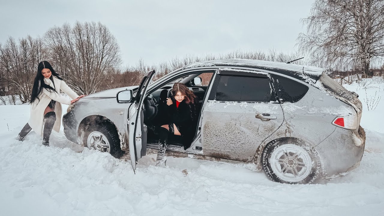 CAR STUCK || Chris and Ellie get stuck in the snow in their 4WD Subaru