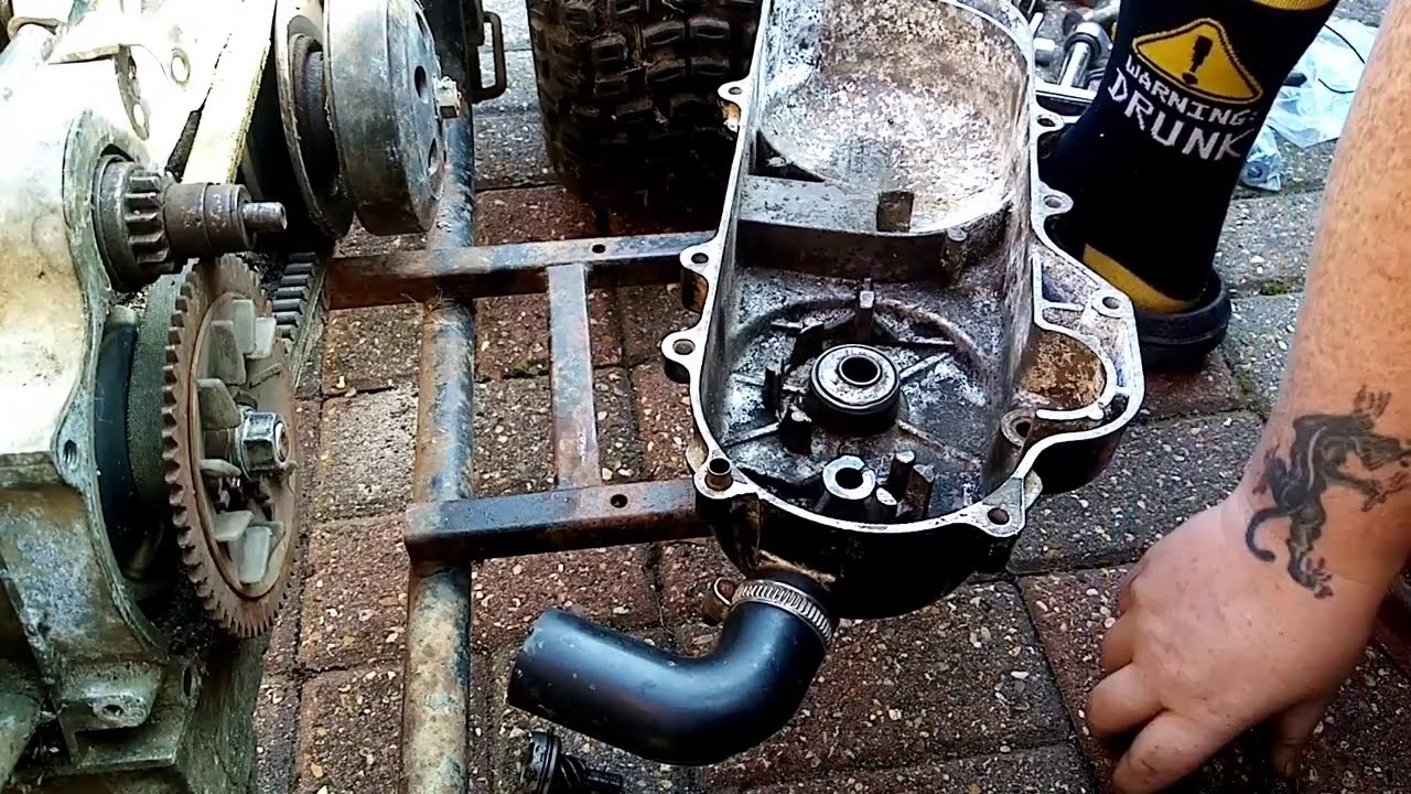 Replace kick start spring in quad