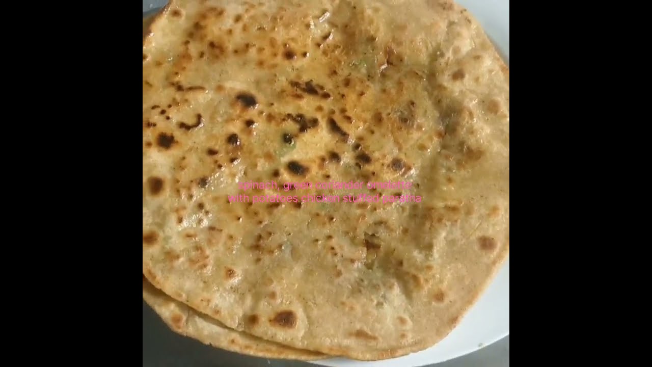 Spinach,Green coriander omelette with potatoes chicken paratha for healthy breakfast 