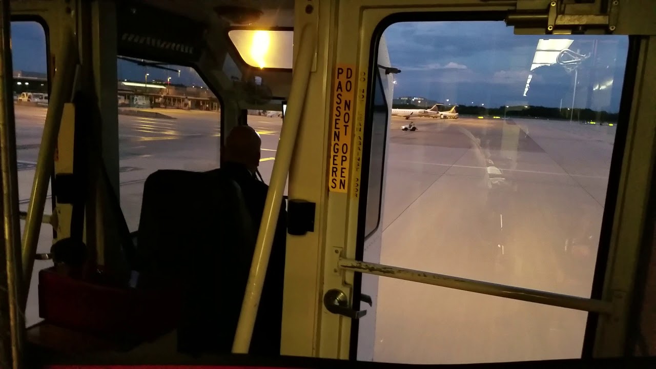 Dulles Airport plane mate mobile lounge ride