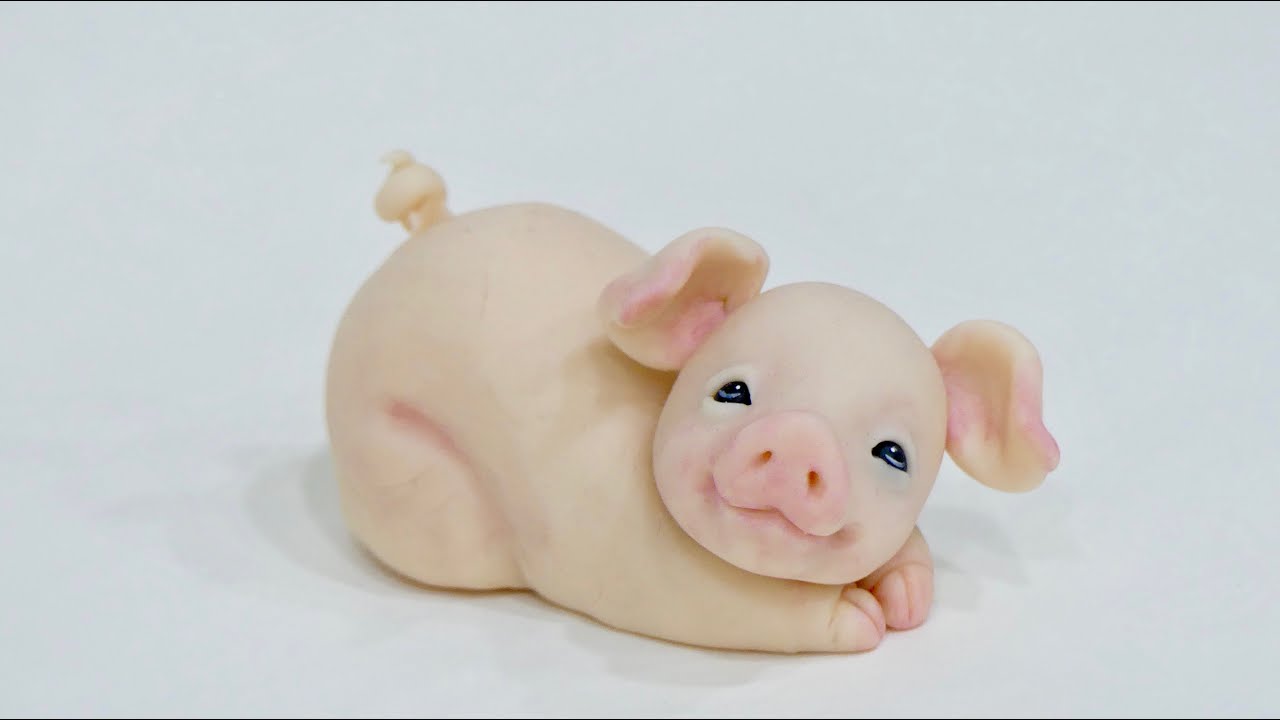 How to make a baby pig. Como modelar un chanchito bebe.