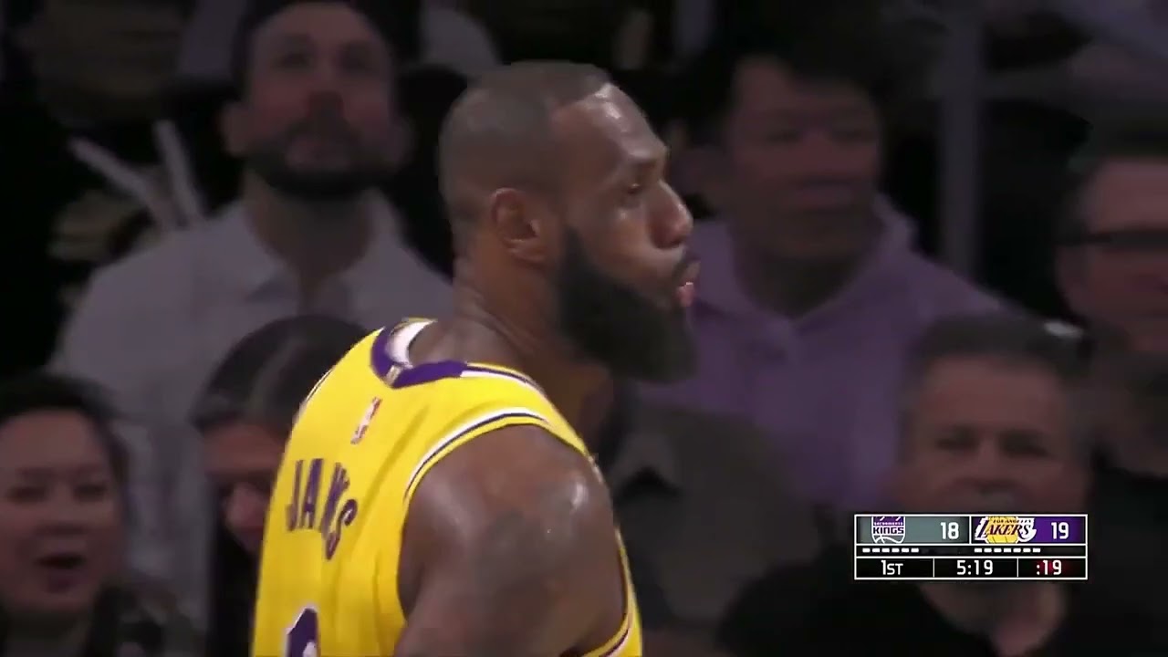 LeBron James shocks the whole arena with a fast break dunk after blocking Harrison Barnes