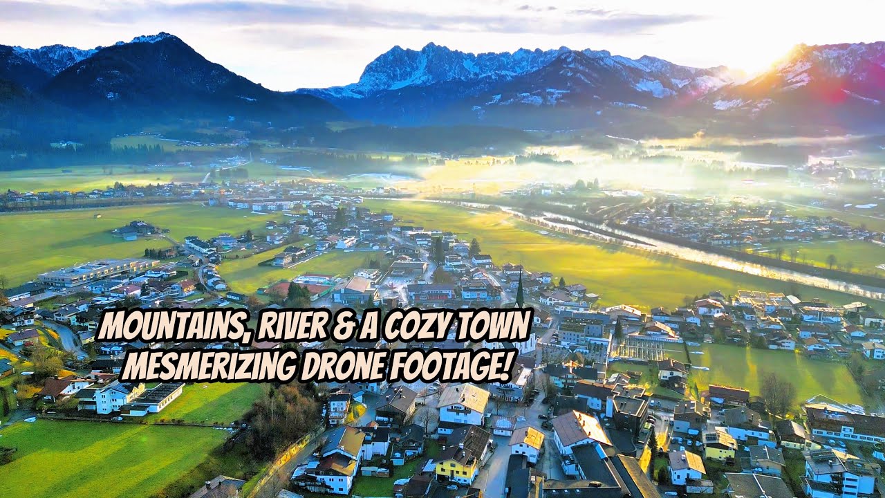 Mountains, river & a cozy town – mesmerizing drone footage!