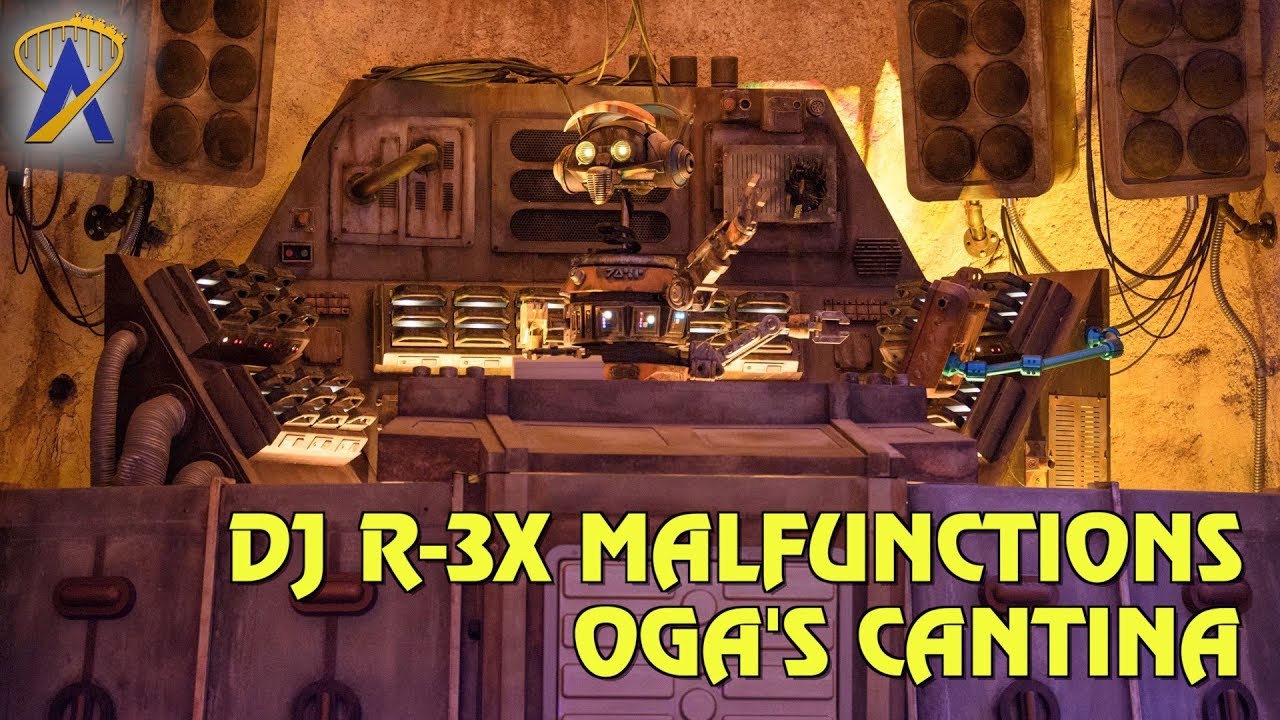 DJ R-3X 'malfunctions' and spouts Star Tours lines inside Oga's Cantina at Star Wars: Galaxy's Edge