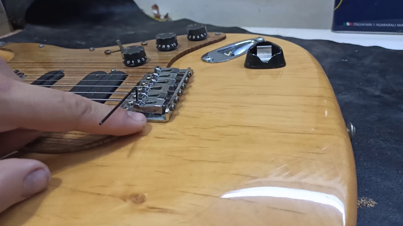 Elektro gitar tel yüksekliği ayarı saddle nedir