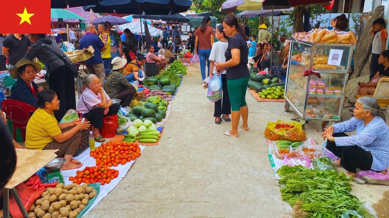 Vietnamese Traditional Market: Farmers Carry Goods to the Voi Market to Sell.