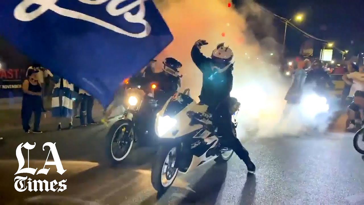 Dodgers fans celebrate at Dodgers Stadium and Echo Park