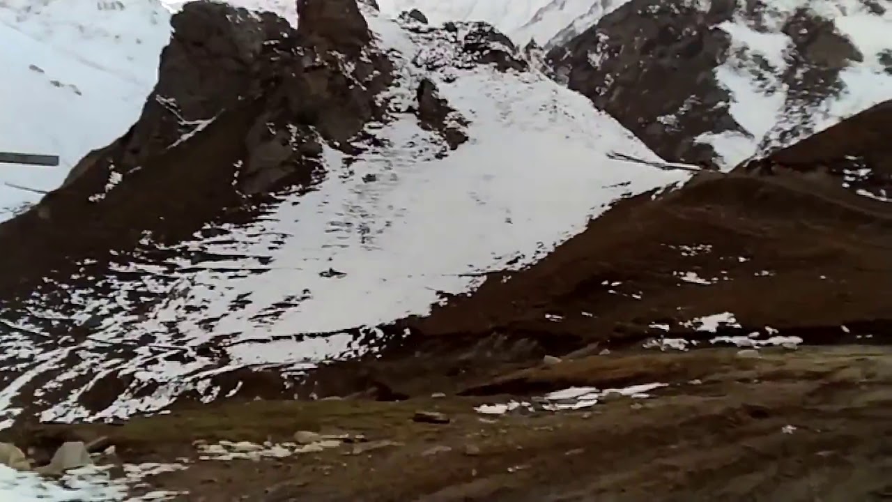 Badgoi pass , snow fall, muddy road