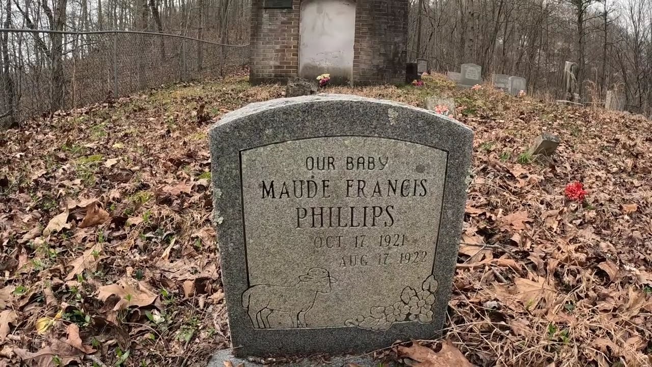 A Coal Miners missing arm and His Baby: George Ezra Phillips and Little Maude-  Kentucky