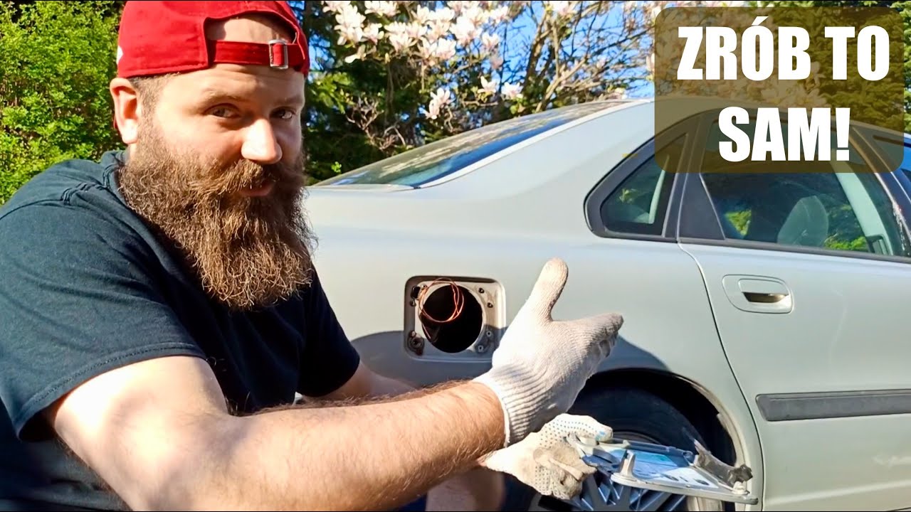 Volvo S80 - jak wymienić pęknięty zawias klapki wlewu paliwa?